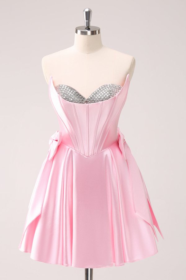 Roze A Line Strapless Korset Kralen Homecoming Jurk met strikken Jetzt online